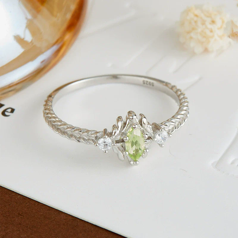 Wholesale Women's Natural Peridot Eyes Pattern Polished Electroplated 925 Silver Ring - Image 2