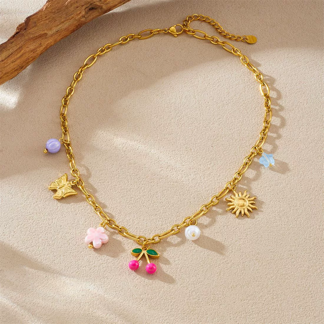 Wholesale Women's Retro Goldplated Stainless Steel Fruitshaped Sun Butterfly Pendant Necklace With O Word Chain - Image 3