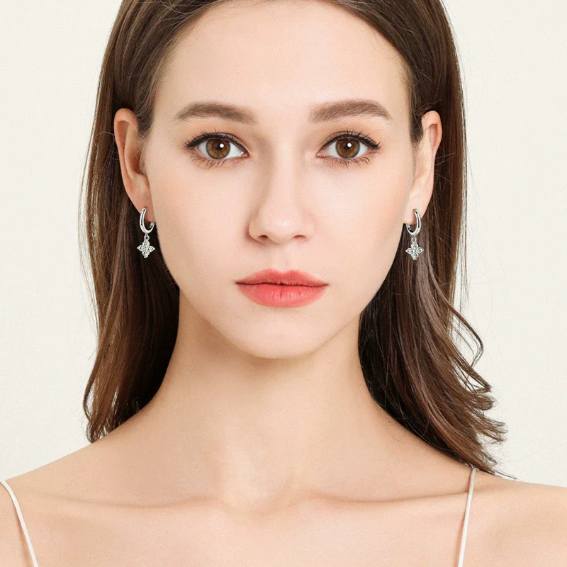Wholesale Women's Simple Flower Patterned 925 Silver And Copper Earrings With Four Leaf Clover