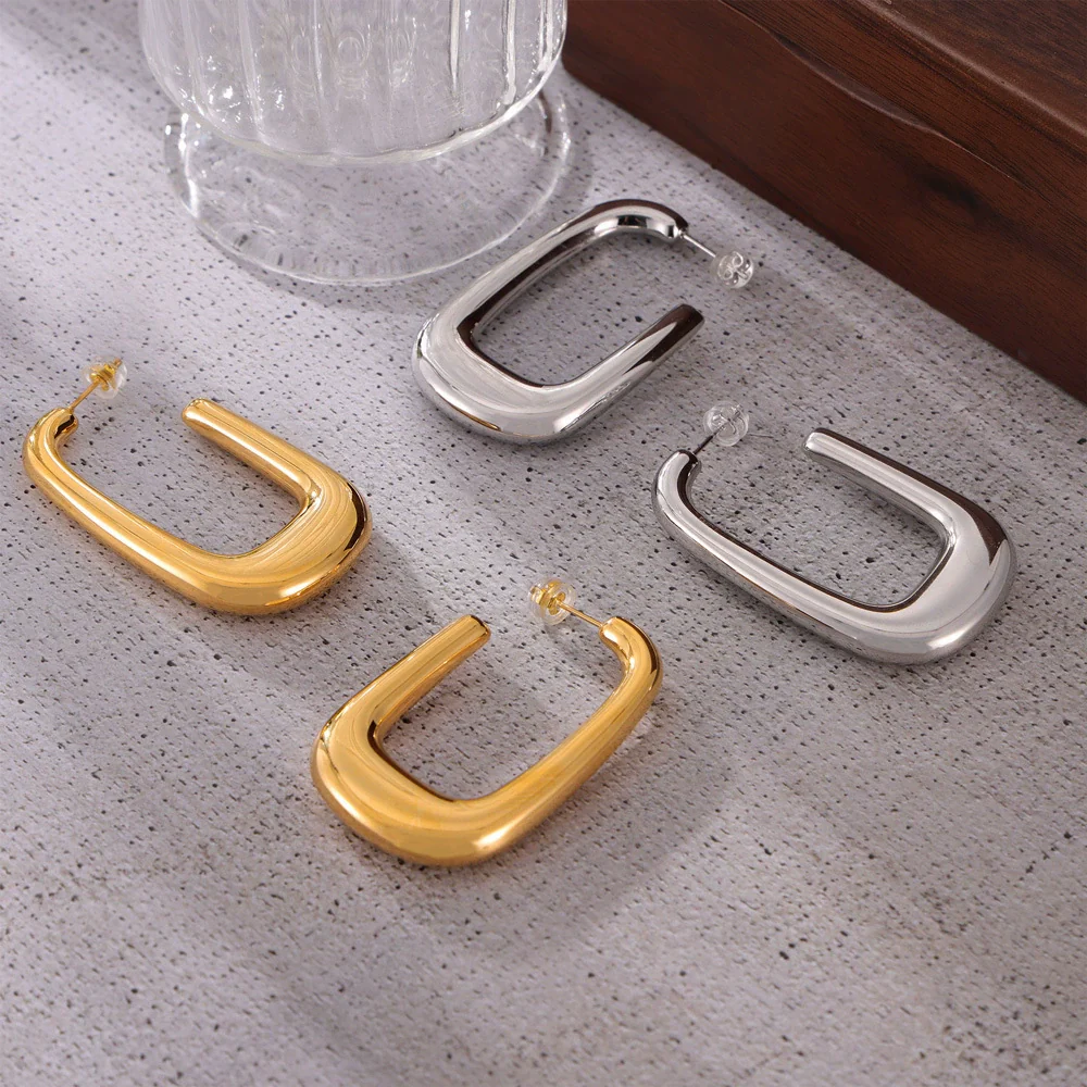 Wholesale Women's Simple Geometric Goldplated Titanium Steel Ushaped Oval Hollow Earrings - Image 4