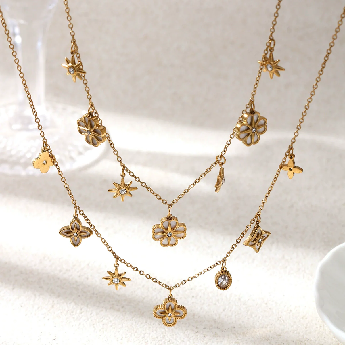 Wholesale Women's Stainless Steel And Titanium Steel Necklace With Flower Star Zircon Inlaid Electroplated Design Sweater Chain