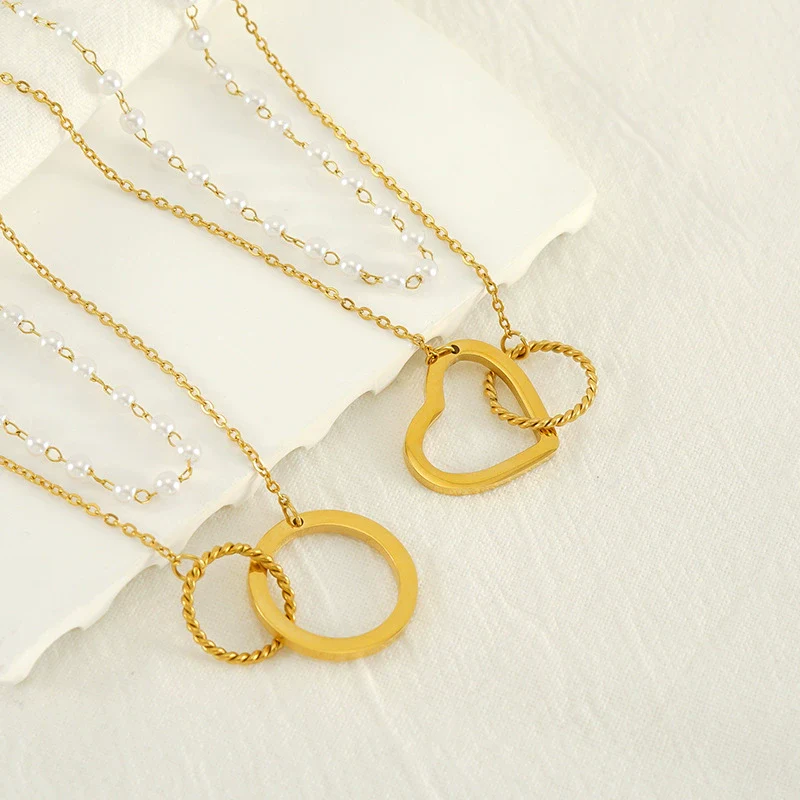 Wholesale Women's 316L Stainless Steel Double Pearl Necklace With Heart And Geometric Pattern Hollow Pendant And Electroplating Treatment - Image 4
