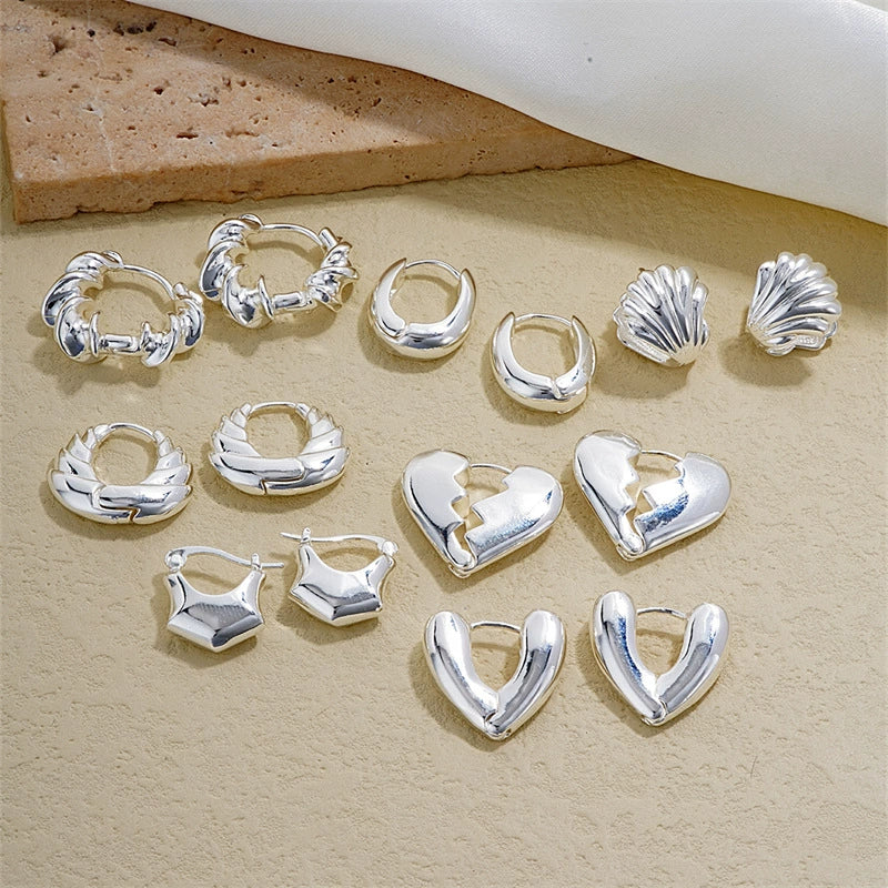 Wholesale Women's Stainless Steel Geometric Ushaped Hollow Exaggerated Simple Silver Glossy Electroplated Earrings - Image 2