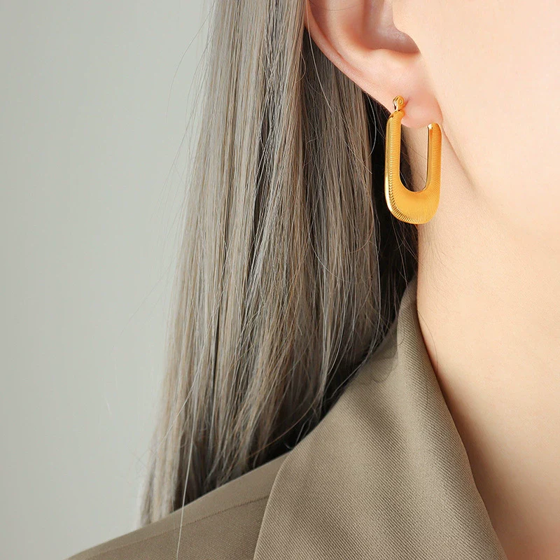 Wholesale Women's Titanium Steel Electroplated 18K Gold Ushaped Striped Earrings