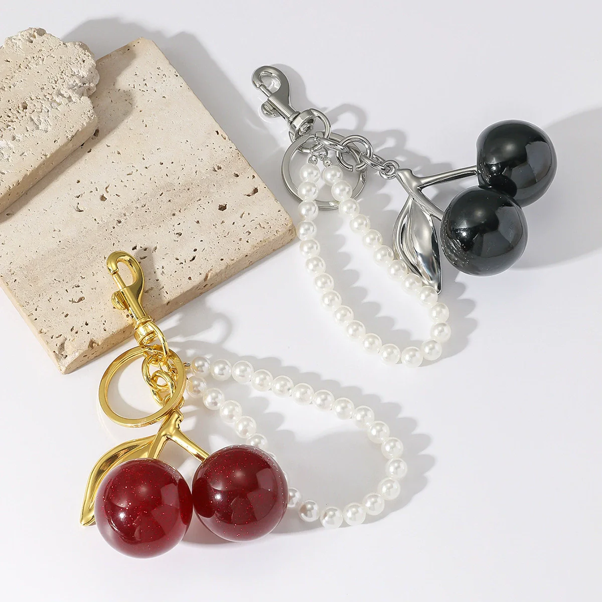 Wholesale Zinc Alloy Fruit Shape Electroplated Resin Cherry Pearl Key Chain Pendant Luggage Charms - Image 2