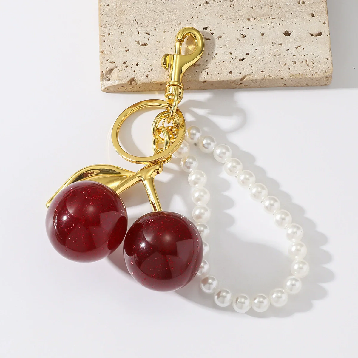 Wholesale Zinc Alloy Fruit Shape Electroplated Resin Cherry Pearl Key Chain Pendant Luggage Charms - Image 4
