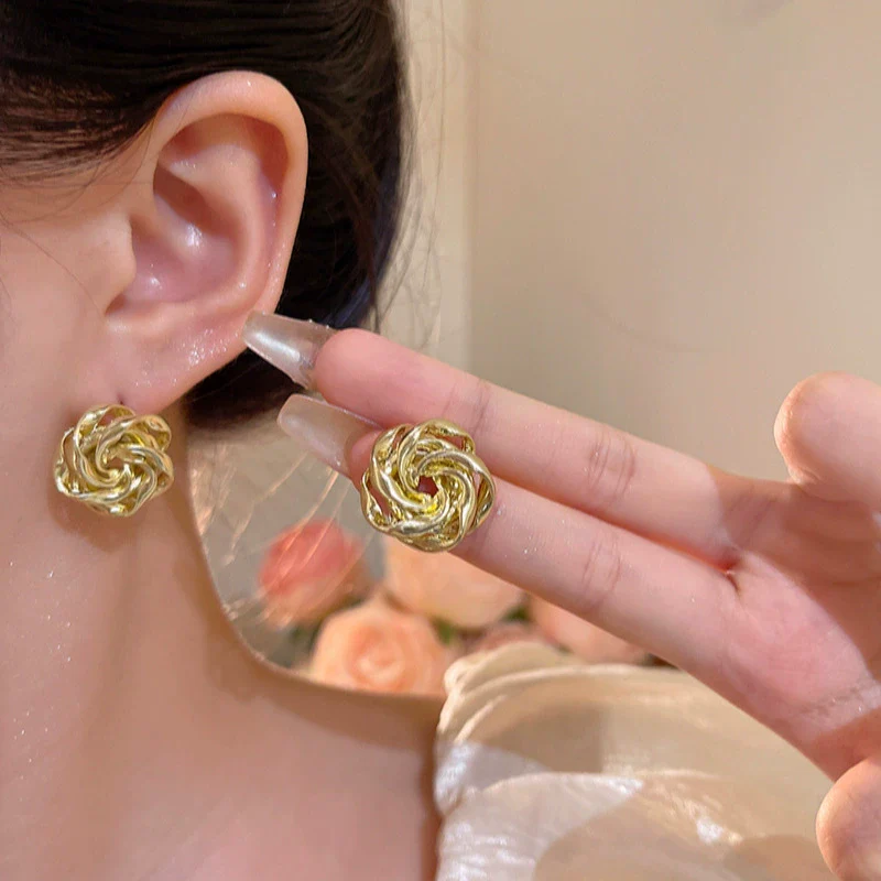 Women's Metal Electroplated Hollow Flower Stud Earrings - Image 4
