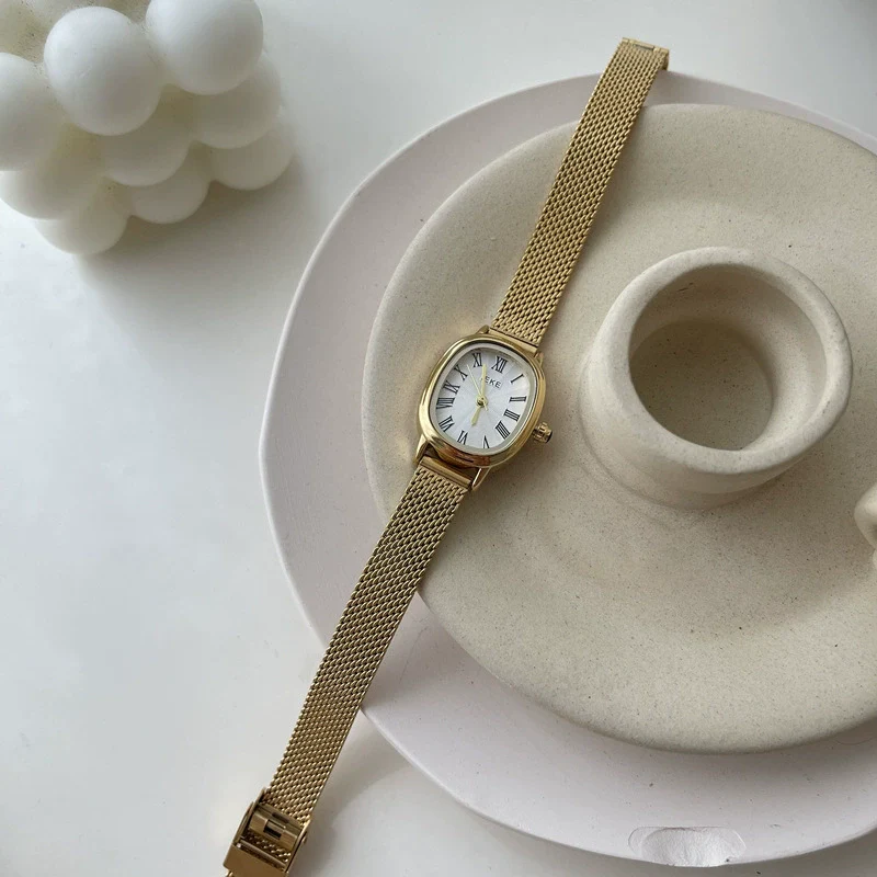 Women's Summer French Retro Alloy Case Ordinary Glass Mirror Oval Thin Band Compact Roman Golden Watch - Image 6