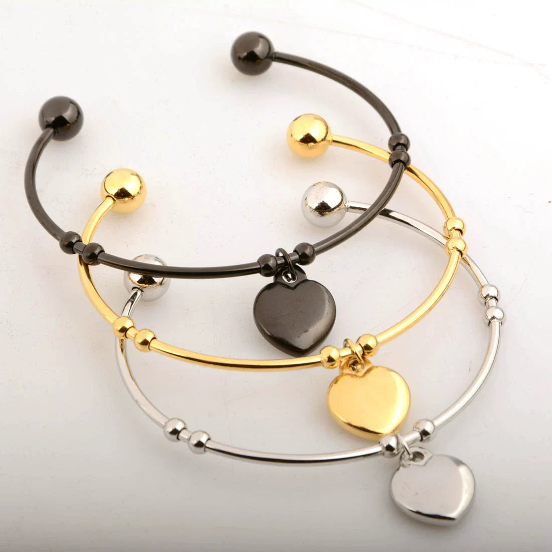 Women's Titanium Steel And Leather Cord Heart Shape Pendant Bracelet With Geometric Pattern And Electroplating