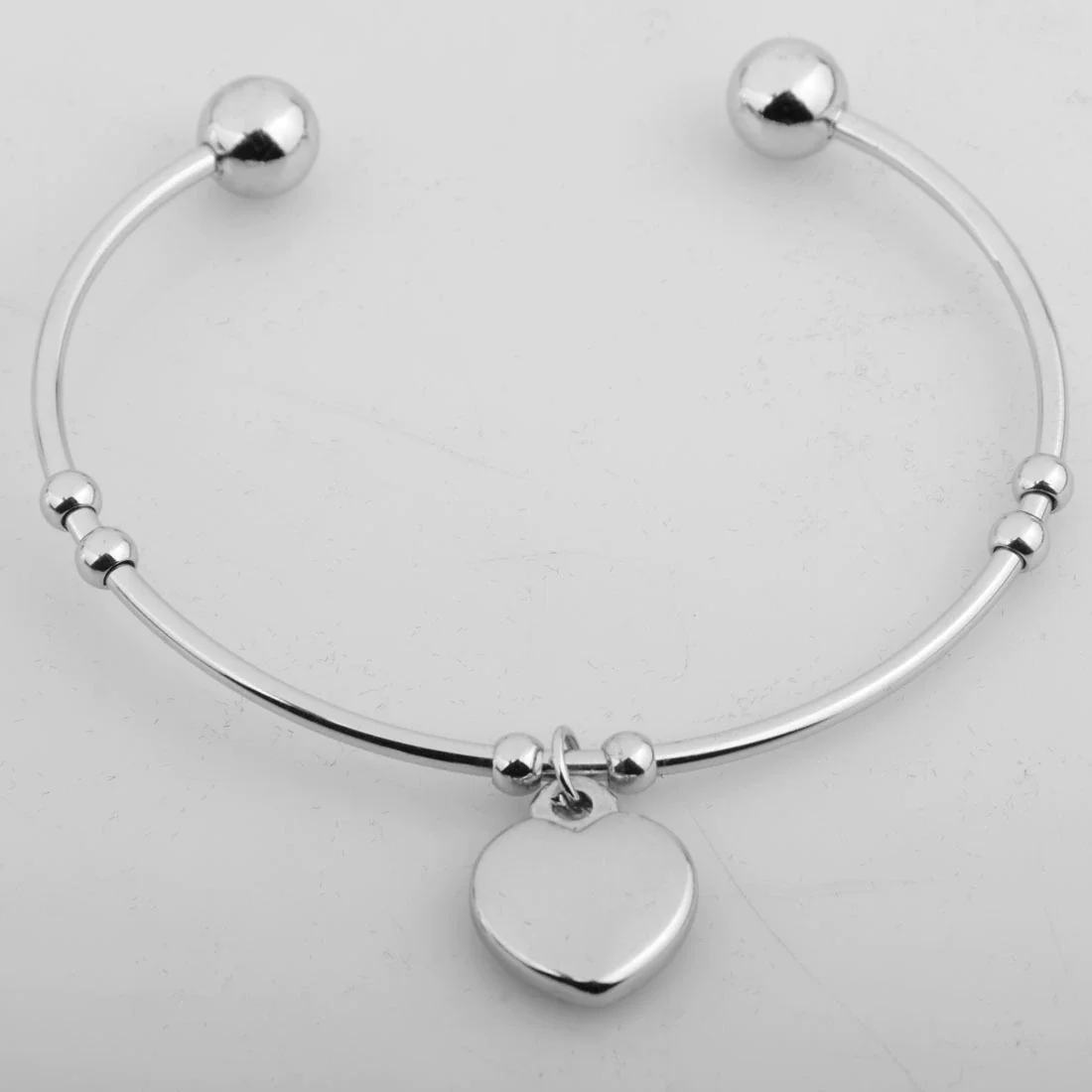 Women's Titanium Steel And Leather Cord Heart Shape Pendant Bracelet With Geometric Pattern And Electroplating - Image 2