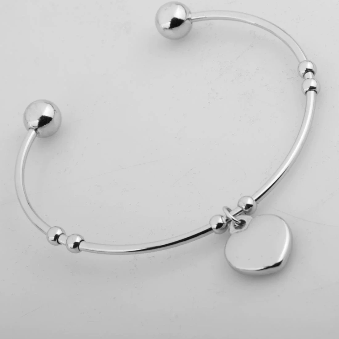 Women's Titanium Steel And Leather Cord Heart Shape Pendant Bracelet With Geometric Pattern And Electroplating - Image 7